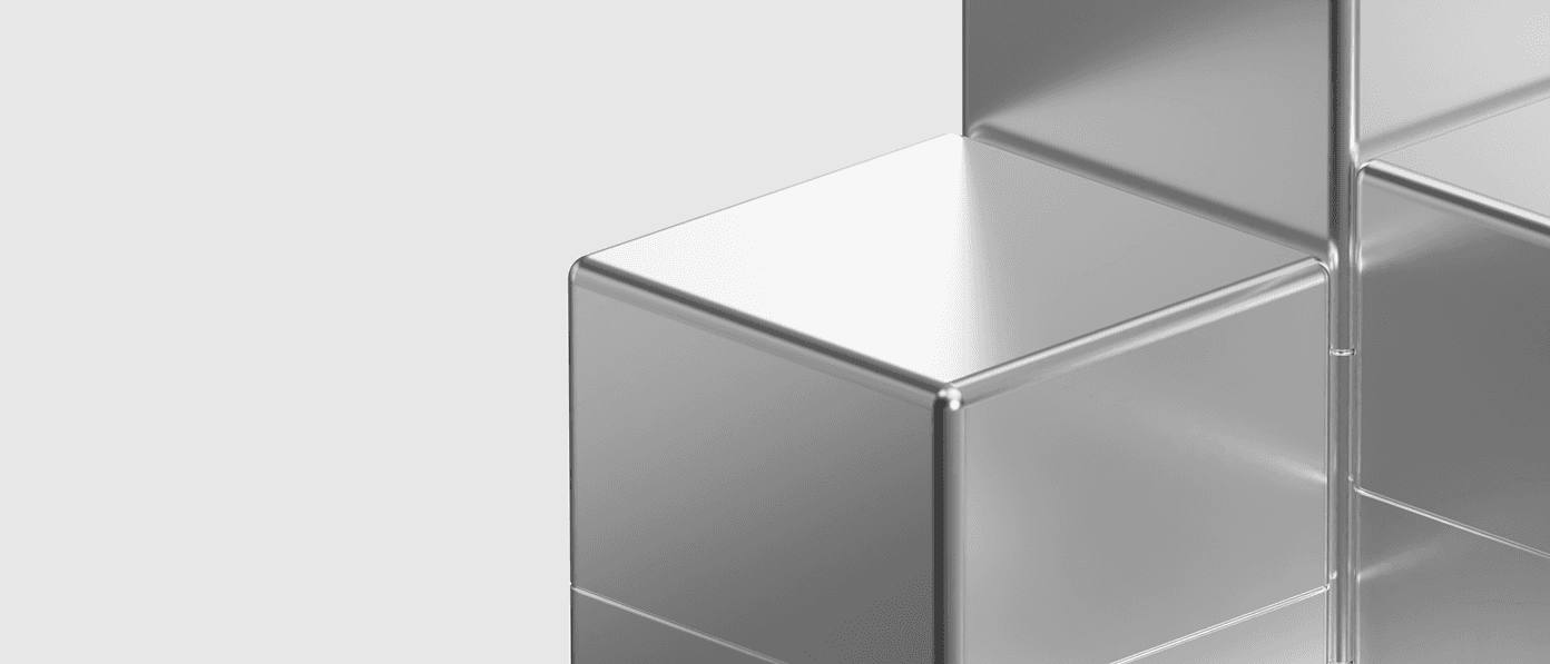 Close-up of polished silver metallic cubes representing secure, self-contained data units